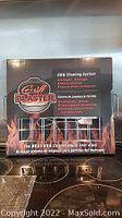 Front of the Grill Blaster BBQ Cleaning System box on stove