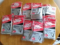 22 vacuum cleaner bags for Royal Dirt Devil Deluxe laid out on table in original packaging.