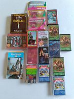 Image showing assortment of vintage cassette tapes arranged flat including Shakespeare Hamlet, Memorex blank cassettes, Christmas themed tapes, Maori music, and other various artists