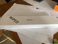 Sealed white Apple Watch Series 3 box showing Series 3 branding and wiped sticker.
