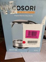 Front of the sealed original box showing Cosori branding, model CO171-GK, and 1.7L capacity details.