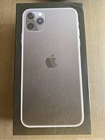 Front of sealed iPhone 11 Pro Max box showing model artwork