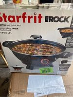 Front of boxed Starfrit The Rock Electric Multi Pot showing product image, brand, and size (4.5L/4.8 Qt).