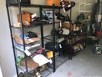 View of entire shelving unit filled with various stored items for size context and appearance.