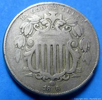 Front view of the 1866 Rays Shield Nickel showing the full shield design, leaves, rays, and the date '1866'. The coin exhibits overall wear consistent with Fine to Very Fine condition.