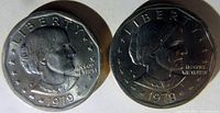 Photo showing two 1979 Susan B. Anthony dollar coins side by side, highlighting differences in rim width.