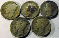 Obverse side of five Mercury dimes showing Lady Liberty wearing a winged cap. Dates visible include 1917, 1918, 1919-S, 1926, and 1927. All coins exhibit signs of circulation and wear.