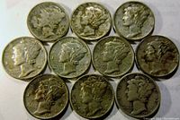 Ten Mercury dimes arranged in two rows showing front (obverse) with visible dates and some wear.