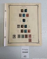 Single album page with various Belgium postage stamps from early years mounted and categorized.