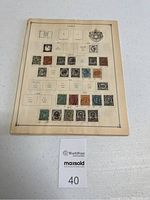 Single album page showing Italian stamps with dated sections and some empty slots