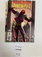 Front cover of Thunderbolts Vol.1 No.64 July 2002 featuring costumed character from behind