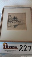 Framed drypoint etching showing a rocky landscape with trees and water, signed and titled by Joe Knowles