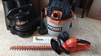 Full view of the three tools together: Toro Super Blower Vac Quietec, Ridgid shop vac, Black & Decker hedge trimmer