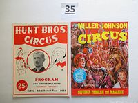 Photo of Hunt Bros Circus 1955 program and Miller-Johnson Circus 1973 souvenir magazine side by side, showing front covers.