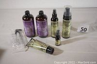 All six WEN hair care products displayed including two large bottles of Lavender Cleaning Conditioner and four Sweet Almond Mint products in various container types.