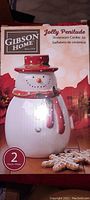 Photo of the Gibson Home Jolly Penitude Stoneware Snowman cookie jar box showing the product image and details