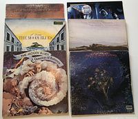 Six Moody Blues vinyl album covers visible, arranged in two rows showcasing titles and artwork.