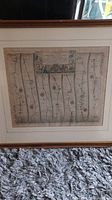 Framed antique map showing multiple vertical road segments with towns and landmarks with title cartouche at top.