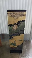 Front view showing hand-painted galloping horse on gold background