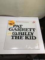Front cover of Bob Dylan soundtrack album "Pat Garrett & Billy the Kid" with title text and price sticker.