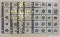 Overview of five binder pages laid side by side, each filled with 25 coins in labeled 2×2 holders.