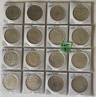 Top-down grid view of all 16 coin obverses in cardboard flips