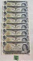 Stack of eight sequential 1973 Canadian $1 bills front side showing Queen Elizabeth II portrait and serial numbers.