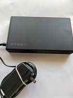 Top view of Dynex hard drive enclosure with power adapter included