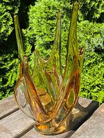 Front-left view of amber glass splash vase showing three tall peaks