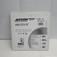 Front view of new Jepson DRYTECH 14-inch saw blade packaging with product details and tooth count marking.