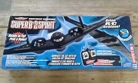 Box for the remote control toy plane Northrop Grumman Super B2 Spirit showing branding and product info.