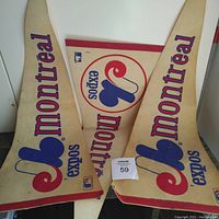 Three Montreal Expos vintage baseball pennants arranged showing logos and text clearly.