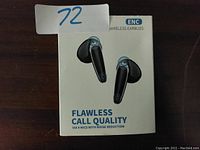 Front view of ENC wireless earbuds box showing the earbuds and 'Flawless Call Quality' claim.