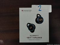 Front of the box showing Monster logo, earbud image, and model name Clarity 101+ Airlinks.