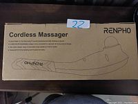 Box showing Renpho Cordless Massager with product features and long handle design.