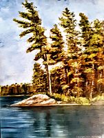 Close-up photo of the vintage oil on board painting depicting a lakeside scene with pine trees, water, and rocks.