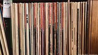 Shelf view showing numerous vinyl LP record spines