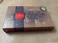 Outer cardboard box featuring Royal Canadian Mint branding and Golden Jubilee theme dated 2002