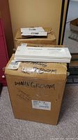 Boxes of Kenwood LS-770 speakers and manual and accessories packets on top