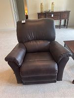 Front view of recliner showing overall shape and upholstery