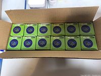 Full opened case showing 12 boxed GloboLight LED bulbs.
