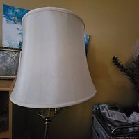Photo of the white fabric lamp shade showing its size and shape.