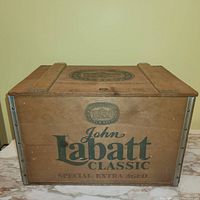Front view of the wooden crate showing the John Labatt Classic logo and 'Special Extra Aged' text.