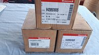 Three original Honeywell boxes stacked, showing V4295S1005 part number and voltage 110/120V labeling.