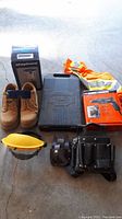 Full overview of lot showing tools, boots, safety goggles, tool belt, lantern, and tube bender kit case.