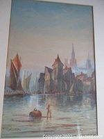 Full view of the watercolor painting showing harbor scene with ships, castles and churches under glass in wooden frame.