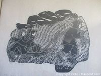 Full view of the stonecut print showing Inuit figures pulling a sled