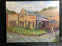 Front full view of varnished acrylic painting on canvas showing abandoned town buildings with prairie and foothills background.