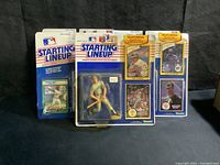 Five Starting Lineup action figures in original packaging with trading cards, featuring Oakland A's players