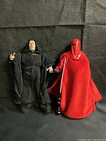 Front view of Emperor Palpatine and Royal Guard Star Wars action figures standing side by side on black background.